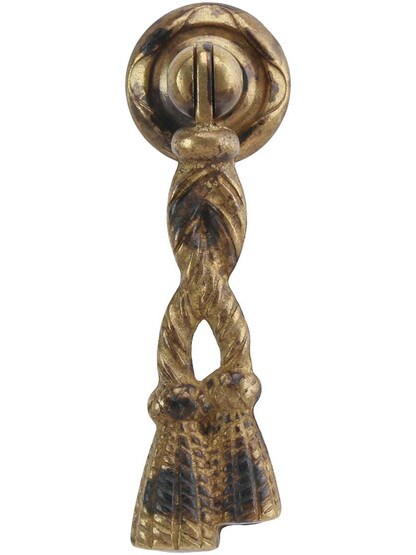 Rope Tassel Drop Pull with Round Rosette - .87 inch x 2.83 inch in Antique Brass Distressed.
